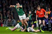 19 March 2022; James Lowe of Ireland is tackled by Darcy Graham of Scotland during the Guinness Six Nations Rugby Championship match between Ireland and Scotland at Aviva Stadium in Dublin. Photo by Brendan Moran/Sportsfile