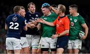 19 March 2022; Referee Wayne Barnes attempts to separate Peter O’Mahony of Ireland and Stuart Hogg of Scotland, second from left, during the Guinness Six Nations Rugby Championship match between Ireland and Scotland at Aviva Stadium in Dublin. Photo by Brendan Moran/Sportsfile