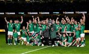 19 March 2022; The Ireland team celebrate with the Triple Crown trophy after the Guinness Six Nations Rugby Championship match between Ireland and Scotland at Aviva Stadium in Dublin. Photo by Brendan Moran/Sportsfile
