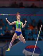 19 March 2022; Tina Šutej of Slovenia celebrates a clearance whilst competing in the women's pole vaultduring day two of the World Indoor Athletics Championships at the Stark Arena in Belgrade, Serbia. Photo by Sam Barnes/Sportsfile