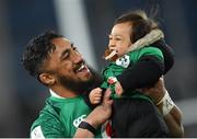 19 March 2022; Bundee Aki of Ireland celebrates with his one year old son Andronicus Junior Papamauin after the Guinness Six Nations Rugby Championship match between Ireland and Scotland at Aviva Stadium in Dublin. Photo by Ramsey Cardy/Sportsfile