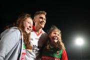 19 March 2022; Conn Kilpatrick of Tyrone poses for a photograph with Mayo supporters after the Allianz Football League Division 1 match between Tyrone and Mayo at O'Neill's Healy Park in Omagh, Tyrone. Photo by Stephen McCarthy/Sportsfile