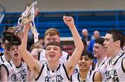 19 March 2022; Éanna captain Cathal O'Sullivan celebrates with the cup after his side's victory in the InsureMyHouse.ie Billy Coffey U18 Men's National Cup Final match between Phoenix BC and Éanna at Neptune Stadium in Cork. Photo by Piaras Ó Mídheach/Sportsfile