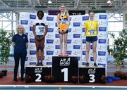 19 March 2022; Women's U14 High Jump medallists, from left, Zion Osasenaga Osawe of Donore Harriers, Dublin, silver, Kate O'Donovan of Leevale AC, Cork, gold, and Hazel Fahy of Loughrea AC, Galway, during day one of the Irish Life Health National Juvenile Indoors at Athlone Institute of Technology in Athlone, Westmeath. Photo by Ben McShane/Sportsfile