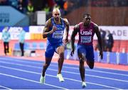 19 March 2022; Lamont Marcell Jacobs of Italy, left, on his way to winning the men's 60m final from Marvin Bracy of USA during day two of the World Indoor Athletics Championships at the Stark Arena in Belgrade, Serbia. Photo by Sam Barnes/Sportsfile