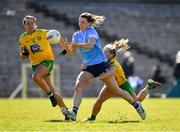 19 March 2022; Jennifer Dunne of Dublin in action against Niamh McLaughlin and Nicole McLaughlin, left, of Donegal during the Lidl Ladies Football National League Division 1 Semi-Final match between Dublin and Donegal at St Tiernach's Park in Clones, Monaghan. Photo by Ray McManus/Sportsfile