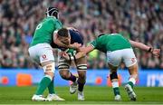 19 March 2022; Matt Fagerson of Scotland is tackled by Caelan Doris and Dan Sheehan of Ireland during the Guinness Six Nations Rugby Championship match between Ireland and Scotland at Aviva Stadium in Dublin. Photo by Brendan Moran/Sportsfile