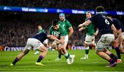 19 March 2022; Conor Murray of Ireland is tackled by Darcy Graham of Scotland on the way to scoring his side's fourth try during the Guinness Six Nations Rugby Championship match between Ireland and Scotland at Aviva Stadium in Dublin. Photo by Brendan Moran/Sportsfile