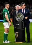 19 March 2022; Ireland captain Jonathan Sexton prepares to receive the Triple Crown trophy after the Guinness Six Nations Rugby Championship match between Ireland and Scotland at Aviva Stadium in Dublin. Photo by Brendan Moran/Sportsfile