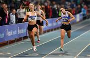 20 March 2022; Abbie Dorney of Belgooly AC, Cork, 846, crosses the line to win ahead of Eve Mooney of Ratoath AC, Dublin, right, in the women's U17 200m during day two of the Irish Life Health National Juvenile Indoors at the Athlone Institute of Technology in Athlone, Westmeath. Photo by Ben McShane/Sportsfile