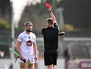 20 March 2022; Gerry Keegan of Kildare is shown a straight red card by referee Michael Kennedy for a tackle on Tommy Gallagher of Westmeath during the Allianz Hurling League Division 2A match between Kildare and Westmeath at St Conleth's Park in Newbridge, Kildare. Photo by Piaras Ó Mídheach/Sportsfile