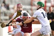 20 March 2022; Johnny Bermingham of Westmeath is tackled by Cathal Dowling, left, and Jack Sheridan of Kildare during the Allianz Hurling League Division 2A match between Kildare and Westmeath at St Conleth's Park in Newbridge, Kildare. Photo by Piaras Ó Mídheach/Sportsfile