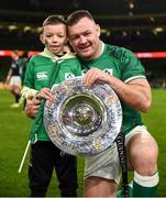 19 March 2022; Dave Kilcoyne of Ireland and his nephew Oisin with the triple crown trophy after the Guinness Six Nations Rugby Championship match between Ireland and Scotland at Aviva Stadium in Dublin. Photo by Harry Murphy/Sportsfile