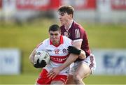 20 March 2022; Ciaran McFaul of Derry in action against Matthew Tierney of Galway during the Allianz Football League Division 2 match between Derry and Galway at Derry GAA Centre of Excellence in Owenbeg, Derry. Photo by Oliver McVeigh/Sportsfile
