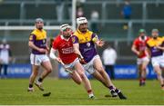 20 March 2022; Oisín Foley of Wexford in action against Shane Barrett of Cork during the Allianz Hurling League Division 1 Group A match between Wexford and Cork at Chadwicks Wexford Park in Wexford. Photo by Daire Brennan/Sportsfile