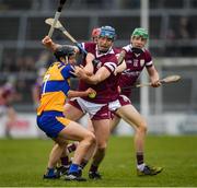 20 March 2022; Conor Cooney of Galway in action against Jack Browne of Clare during the Allianz Hurling League Division 1 Group A match between Galway and Clare at Pearse Stadium in Galway. Photo by Ray Ryan/Sportsfile