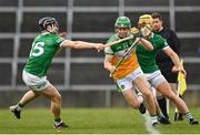 20 March 2022; John Murphy of Offaly in action against Graeme Mulcahy of Limerick during the Allianz Hurling League Division 1 Group A match between Limerick and Offaly at TUS Gaelic Grounds in Limerick. Photo by Seb Daly/Sportsfile