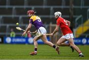 20 March 2022; Cathal Dunbar of Wexford in action against Luke Meade of Cork during the Allianz Hurling League Division 1 Group A match between Wexford and Cork at Chadwicks Wexford Park in Wexford. Photo by Daire Brennan/Sportsfile