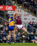 20 March 2022; Conor Cooney of Galway in action against David McInerney of Clare during the Allianz Hurling League Division 1 Group A match between Galway and Clare at Pearse Stadium in Galway. Photo by Ray Ryan/Sportsfile