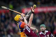 20 March 2022; Aaron Fitzgerald of Clare in action against Conor Whelan of Galway during the Allianz Hurling League Division 1 Group A match between Galway and Clare at Pearse Stadium in Galway. Photo by Ray Ryan/Sportsfile