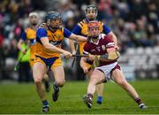 20 March 2022; Ronan Glennon of Galway in action against David McInerney of Clare during the Allianz Hurling League Division 1 Group A match between Galway and Clare at Pearse Stadium in Galway. Photo by Ray Ryan/Sportsfile