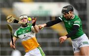 20 March 2022; Eoghan Cahill of Offaly in action against Gearoid Hegarty of Limerick during the Allianz Hurling League Division 1 Group A match between Limerick and Offaly at TUS Gaelic Grounds in Limerick. Photo by Seb Daly/Sportsfile