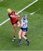 20 March 2022; Aisling O'Neill of Dublin attempts to block the shot of Dearbhla Magee of Down using her hands during the Littlewoods Ireland Camogie League Division 1 match between Dublin and Down at Croke Park in Dublin. Photo by Stephen McCarthy/Sportsfile