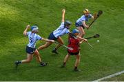 20 March 2022; Clara Cowan of Down in action against Dublin players, from left, Roisin Baker, Emma O'Byrne and Orla Gray during the Littlewoods Ireland Camogie League Division 1 match between Dublin and Down at Croke Park in Dublin. Photo by Stephen McCarthy/Sportsfile