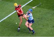 20 March 2022; Aisling O'Neill of Dublin attempts to block the shot of Dearbhla Magee of Down using her hands during the Littlewoods Ireland Camogie League Division 1 match between Dublin and Down at Croke Park in Dublin. Photo by Stephen McCarthy/Sportsfile
