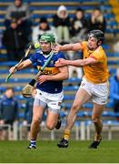 20 March 2022; Noel McGrath of Tipperary in action against Joe Maskey of Antrim during the Allianz Hurling League Division 1 Group B match between Tipperary and Antrim at Semple Stadium in Thurles, Tipperary. Photo by Harry Murphy/Sportsfile