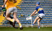 20 March 2022; John Meagher of Tipperary shoots to score his side's sixth goal past Antrim goalkeeper Paul McMullan during the Allianz Hurling League Division 1 Group B match between Tipperary and Antrim at Semple Stadium in Thurles, Tipperary. Photo by Harry Murphy/Sportsfile
