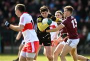20 March 2022; Odhran Lynch of Derry in action against Robert Finnerty of Galway during the Allianz Football League Division 2 match between Derry and Galway at Derry GAA Centre of Excellence in Owenbeg, Derry. Photo by Oliver McVeigh/Sportsfile