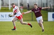20 March 2022; Ciaran McFaul of Derry in action against Johnny Heaney of Galway during the Allianz Football League Division 2 match between Derry and Galway at Derry GAA Centre of Excellence in Owenbeg, Derry. Photo by Oliver McVeigh/Sportsfile
