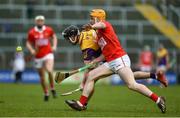 20 March 2022; Corey Byrne Dunbar of Wexford in action against Niall O’Leary of Cork during the Allianz Hurling League Division 1 Group A match between Wexford and Cork at Chadwicks Wexford Park in Wexford. Photo by Daire Brennan/Sportsfile