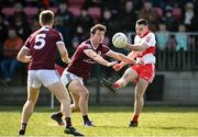 20 March 2022; Niall Toner of Derry is blocked down by Owen Gallagher of Galway during the Allianz Football League Division 2 match between Derry and Galway at Derry GAA Centre of Excellence in Owenbeg, Derry. Photo by Oliver McVeigh/Sportsfile