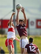 20 March 2022; Matthew Tierney of Galway in action against Conor Glass of Derry during the Allianz Football League Division 2 match between Derry and Galway at Derry GAA Centre of Excellence in Owenbeg, Derry. Photo by Oliver McVeigh/Sportsfile