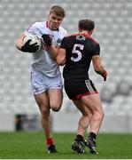 20 March 2022; John Cooper of Cork is shouldered by Darren O'Hagan of Down during the Allianz Football League Division 2 match between Cork and Down at Páirc Uí Chaoimh in Cork. Photo by Brendan Moran/Sportsfile