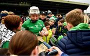 20 March 2022; Cian Lynch of Limerick signs hurleys for supporters after his side's victory in the Allianz Hurling League Division 1 Group A match between Limerick and Offaly at TUS Gaelic Grounds in Limerick. Photo by Seb Daly/Sportsfile