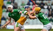 20 March 2022; Padraig Cantwell of Offaly in action against Aaron Gillane, left, and Tom Morrissey of Limerick during the Allianz Hurling League Division 1 Group A match between Limerick and Offaly at TUS Gaelic Grounds in Limerick. Photo by Seb Daly/Sportsfile