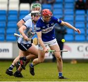 20 March 2022; Fiachra Fennell of Laois in action against Jake Malone of Dublin during the Allianz Hurling League Division 1 Group B match between Laois and Dublin at MW Hire O'Moore Park in Portlaoise, Laois. Photo by Matt Browne/Sportsfile