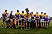 20 March 2022; Lee Chin of Wexford waits for team-mates to join the team photograph ahead of the Allianz Hurling League Division 1 Group A match between Wexford and Cork at Chadwicks Wexford Park in Wexford. Photo by Daire Brennan/Sportsfile