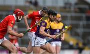 20 March 2022; Liam Óg McGovern of Wexford in action against Robert Downey of Cork during the Allianz Hurling League Division 1 Group A match between Wexford and Cork at Chadwicks Wexford Park in Wexford. Photo by Daire Brennan/Sportsfile