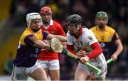 20 March 2022; Ger Collins of Cork in action against Oisín Pepper of Wexford during the Allianz Hurling League Division 1 Group A match between Wexford and Cork at Chadwicks Wexford Park in Wexford. Photo by Daire Brennan/Sportsfile