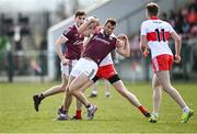 20 March 2022; Paul Conroy of Galway in action against Emmet Bradley of Derry during the Allianz Football League Division 2 match between Derry and Galway at Derry GAA Centre of Excellence in Owenbeg, Derry. Photo by Oliver McVeigh/Sportsfile