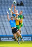 20 March 2022; Robert McDaid, left, and Brian Fenton of Dublin in action against Ódhrán McFadden Ferry and Jason McGee, right, of Donegal during the Allianz Football League Division 1 match between Dublin and Donegal at Croke Park in Dublin. Photo by Stephen McCarthy/Sportsfile
