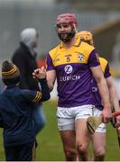 20 March 2022; Paudie Foley of Wexford celebrates with supporters after the Allianz Hurling League Division 1 Group A match between Wexford and Cork at Chadwicks Wexford Park in Wexford. Photo by Daire Brennan/Sportsfile