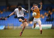 20 March 2022; Patrick O'Keane of Wicklow in action against Jack Duggan of Longford during the Allianz Football League Division 3 match between Longford and Wicklow at Glennon Brothers Pearse Park in Longford. Photo by Philip Fitzpatrick/Sportsfile