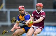 20 March 2022; Tom Monaghan of Galway in action against John Conlon of Clare during the Allianz Hurling League Division 1 Group A match between Galway and Clare at Pearse Stadium in Galway. Photo by Ray Ryan/Sportsfile