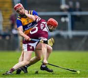 20 March 2022; Tom Monaghan of Galway in action against John Conlon of Clare during the Allianz Hurling League Division 1 Group A match between Galway and Clare at Pearse Stadium in Galway. Photo by Ray Ryan/Sportsfile