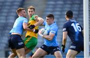 20 March 2022; Brian Howard of Dublin with the support of team-mates Jonny Cooper, left, and goalkeeper Michael Shiel in action against Stephen McMenamin of Donegal during the Allianz Football League Division 1 match between Dublin and Donegal at Croke Park in Dublin. Photo by Stephen McCarthy/Sportsfile